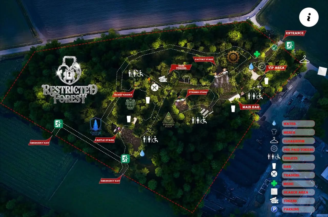 Aerial site map showing the four realm stages, entrance, bars, toilets, water points, medic, cloakroom, tokens and both emergency exits across the wooded site, with the boundary marked in red